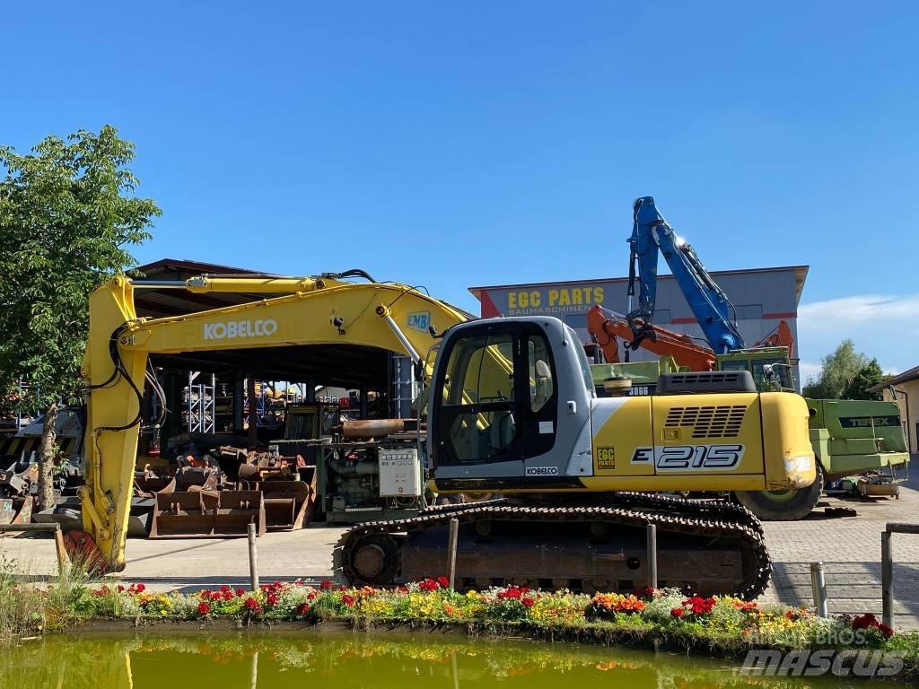 New Holland E 215 Bagri goseničarji