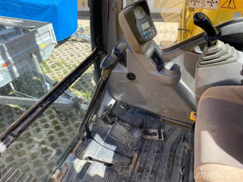 New Holland E 215 Bagri goseničarji