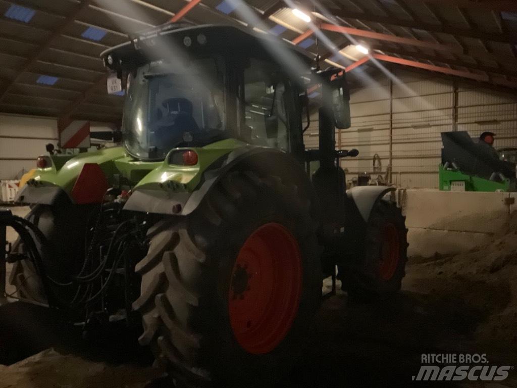 CLAAS ARION 650 cis + Traktorji