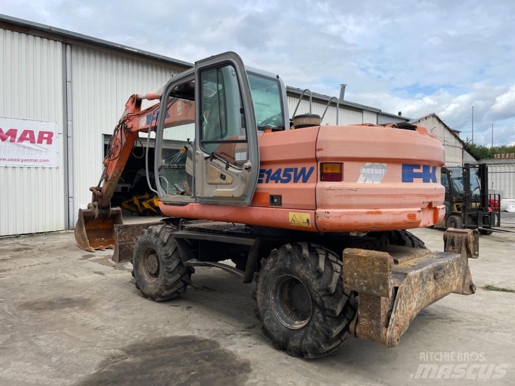Kobelco E145W Bagri na kolesih