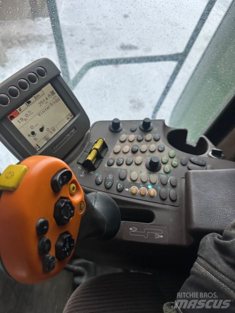 John Deere T550 Kombajni