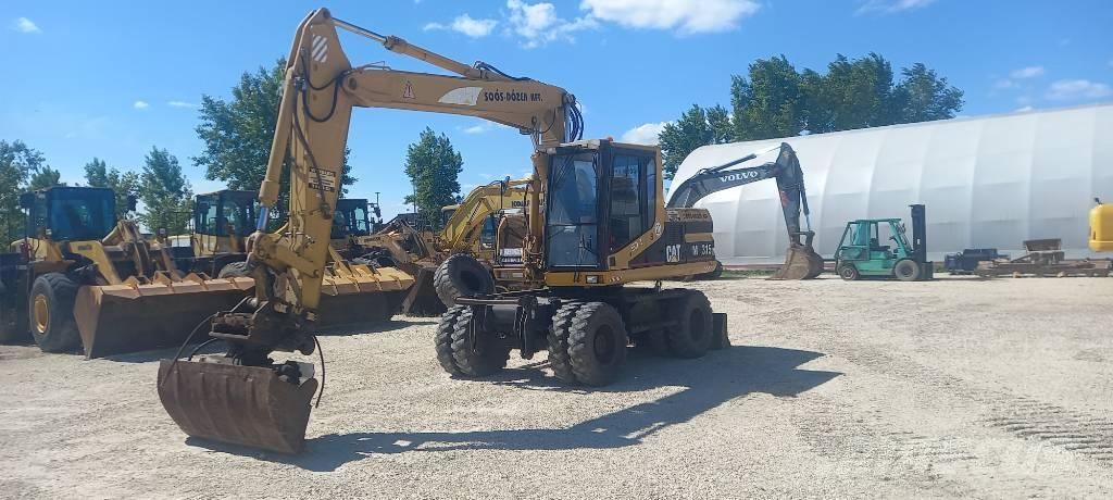 CAT M 315 Bagri na kolesih