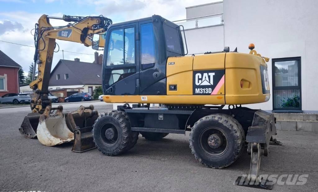CAT M 313 D Bagri na kolesih