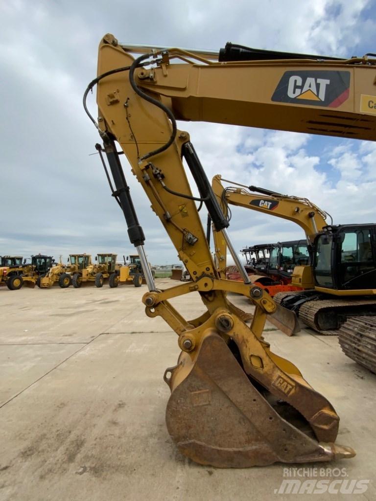 CAT 323 Bagri goseničarji