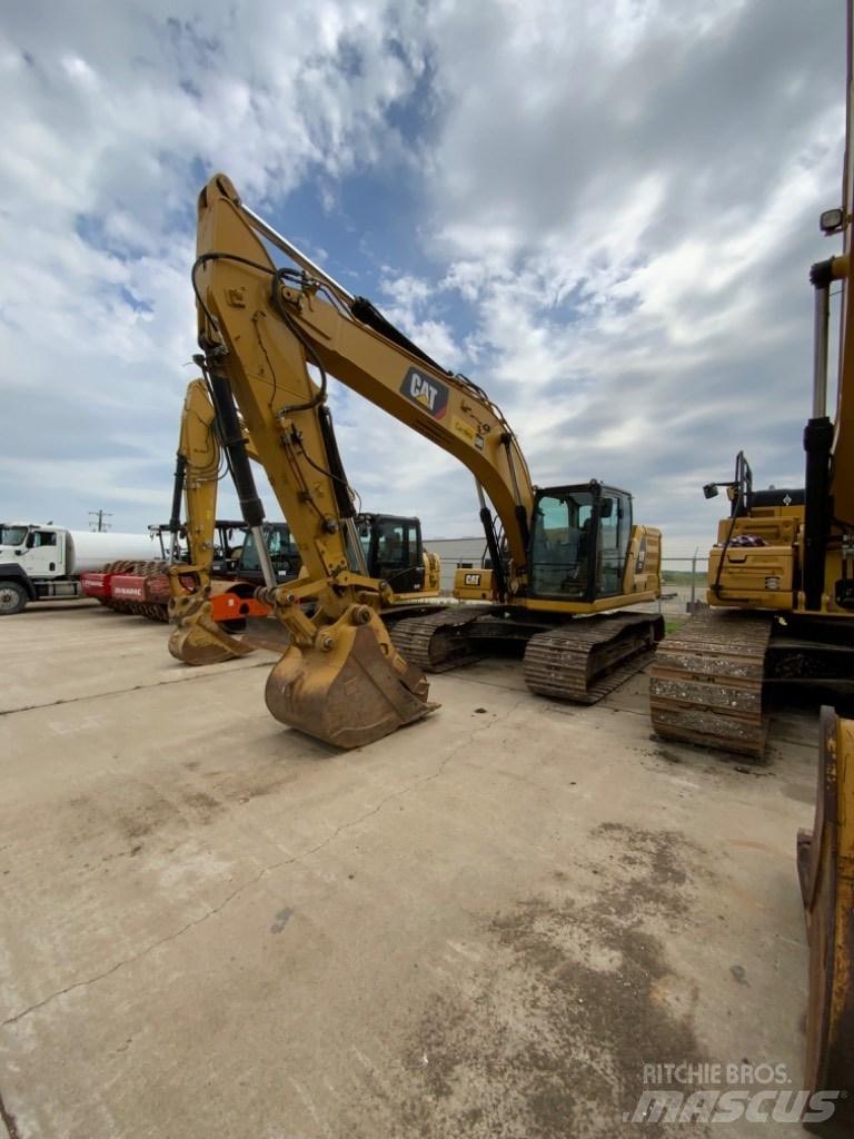 CAT 323 Bagri goseničarji