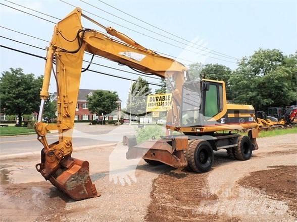 CAT M320 Bagri na kolesih