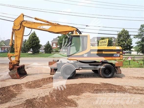 CAT M320 Bagri na kolesih