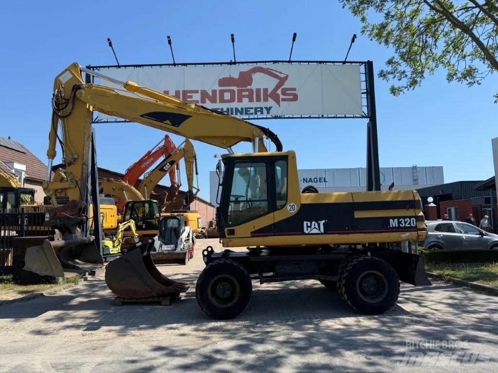 CAT M320 2001 Bagri na kolesih