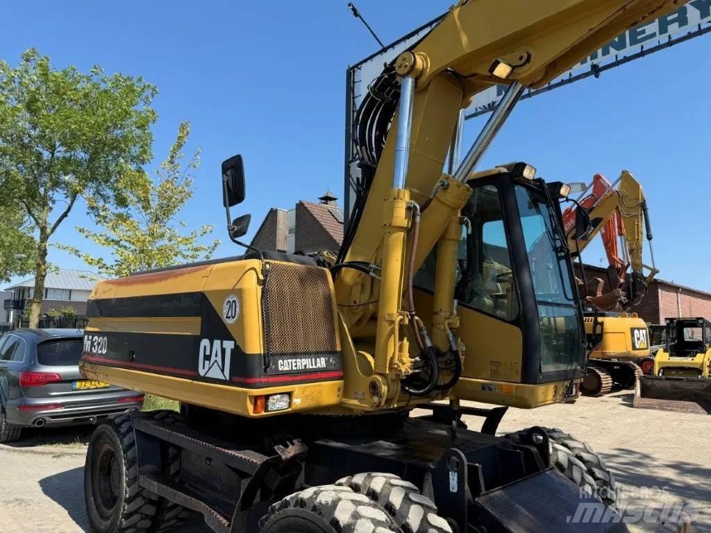 CAT M320 2001 Bagri na kolesih