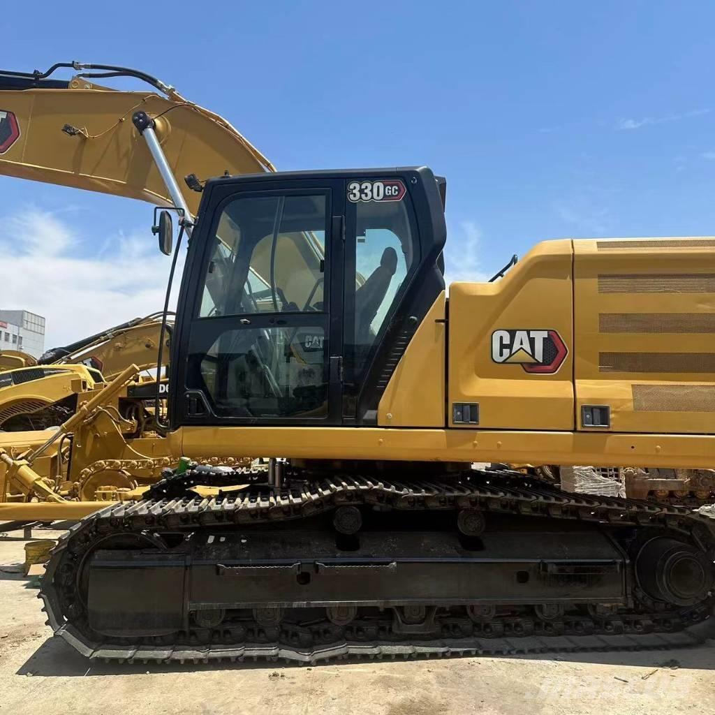 CAT 330 Bagri goseničarji