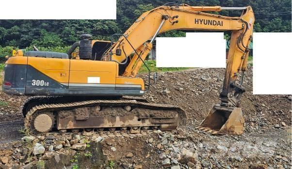 Hyundai Robex 300 LC Bagri goseničarji