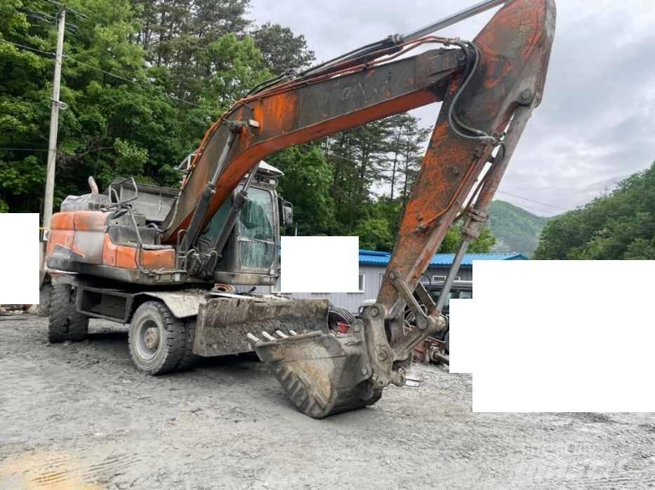 Doosan DX 210 W Bagri na kolesih