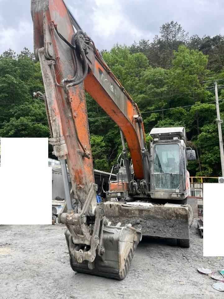 Doosan DX 210 W Bagri na kolesih