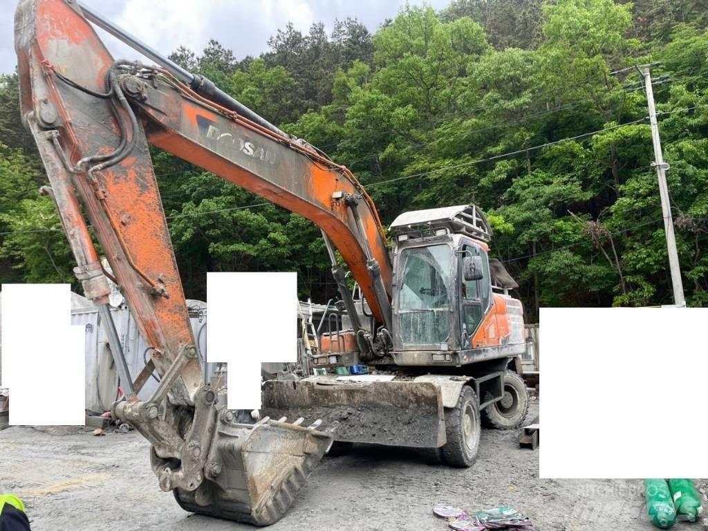 Doosan DX 210 W Bagri na kolesih