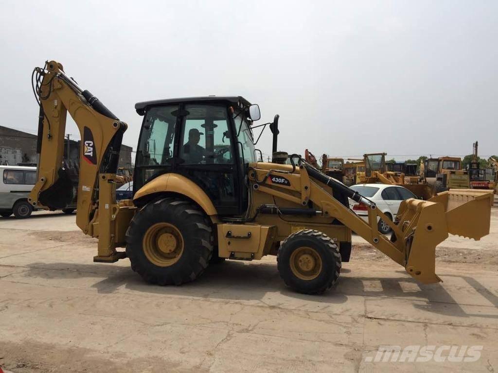 CAT 430F Rovokopači
