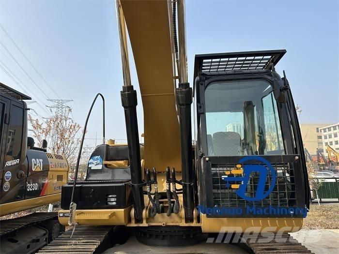 CAT 323D/323/323DL Bagri goseničarji