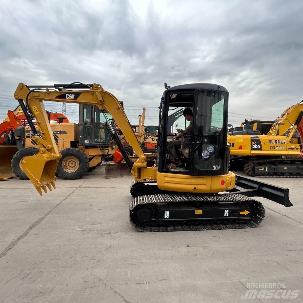 CAT 304 Bagri goseničarji