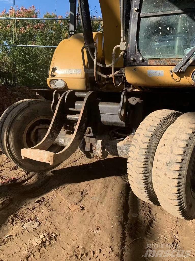 CAT 315 D Bagri na kolesih