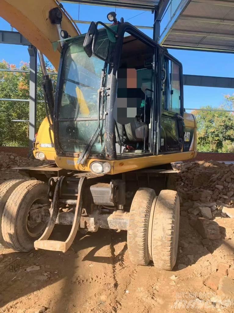 CAT 315 D Bagri na kolesih