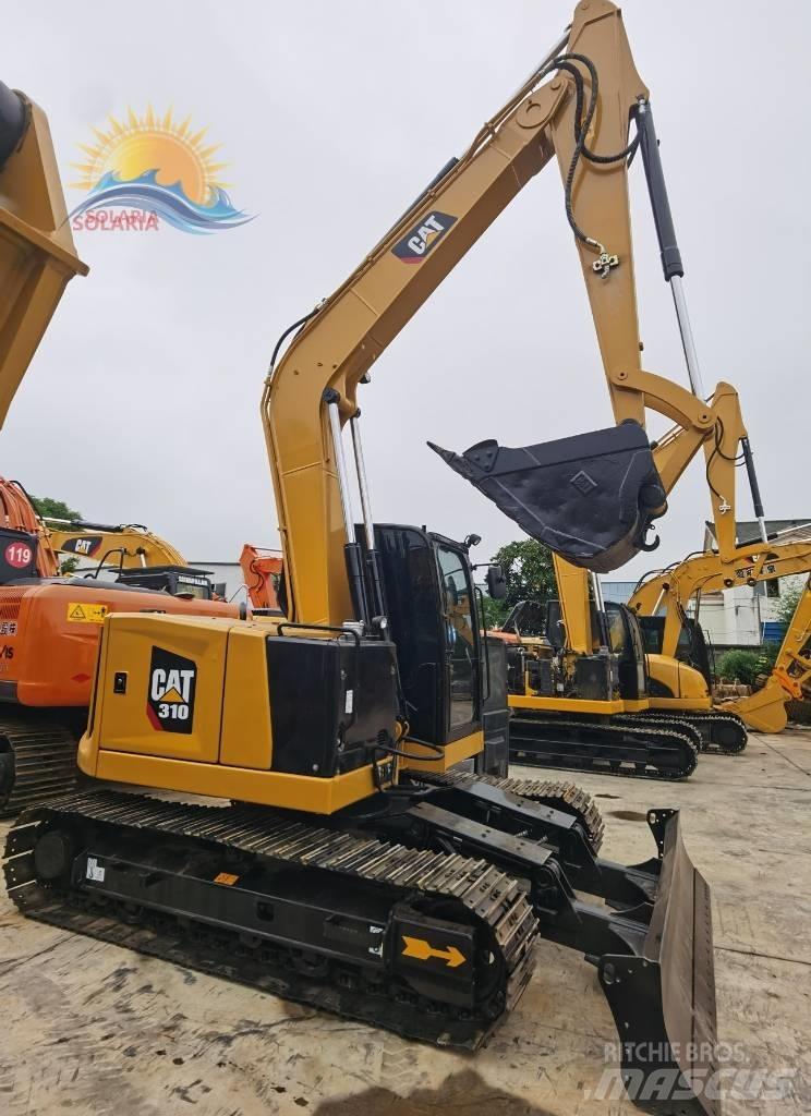 CAT 310 Bagri goseničarji