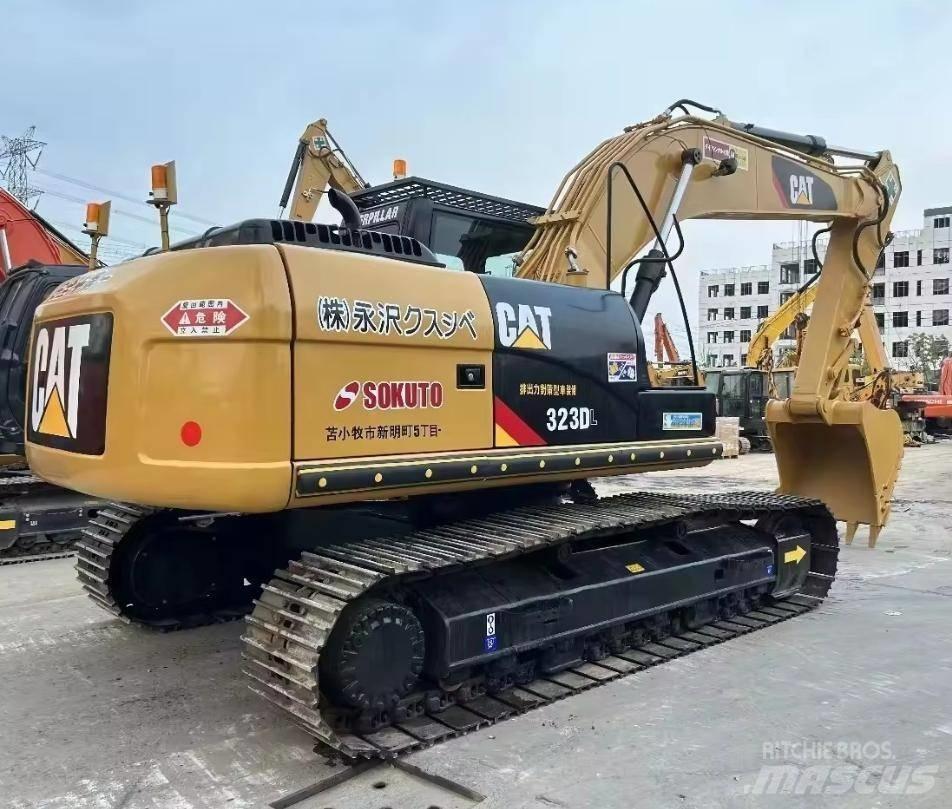 CAT 323 Bagri goseničarji