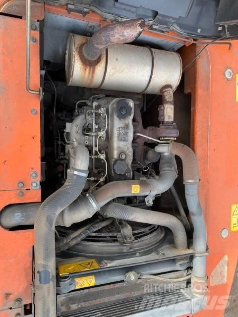 Hitachi ZX 180 W Bagri na kolesih