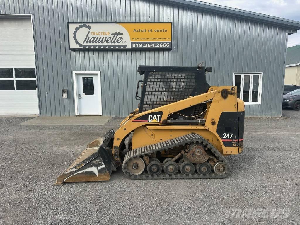 CAT 247 Skid steer mini nakladalci