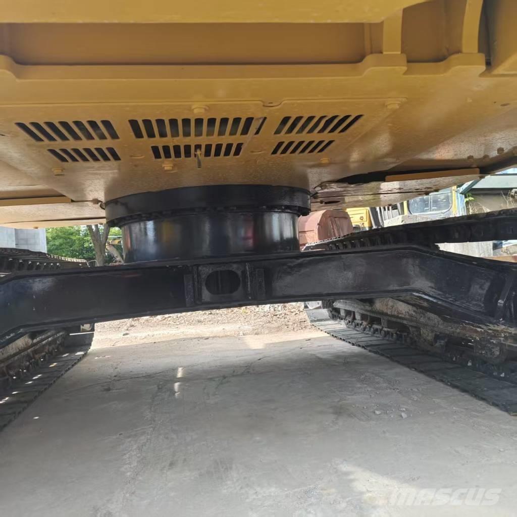 CAT 310 Bagri goseničarji