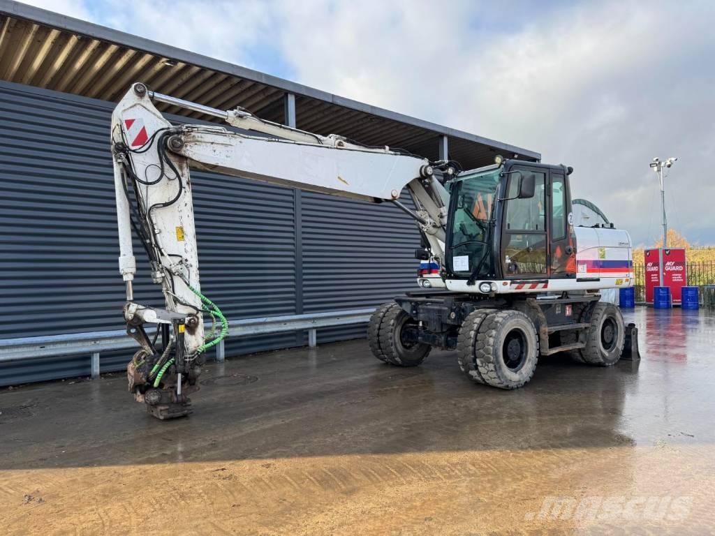 CAT M315D Bagri na kolesih