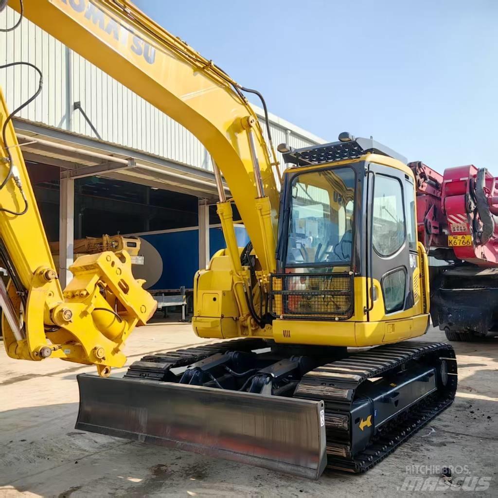Komatsu PC 128 US Midi bagri 7t – 12t