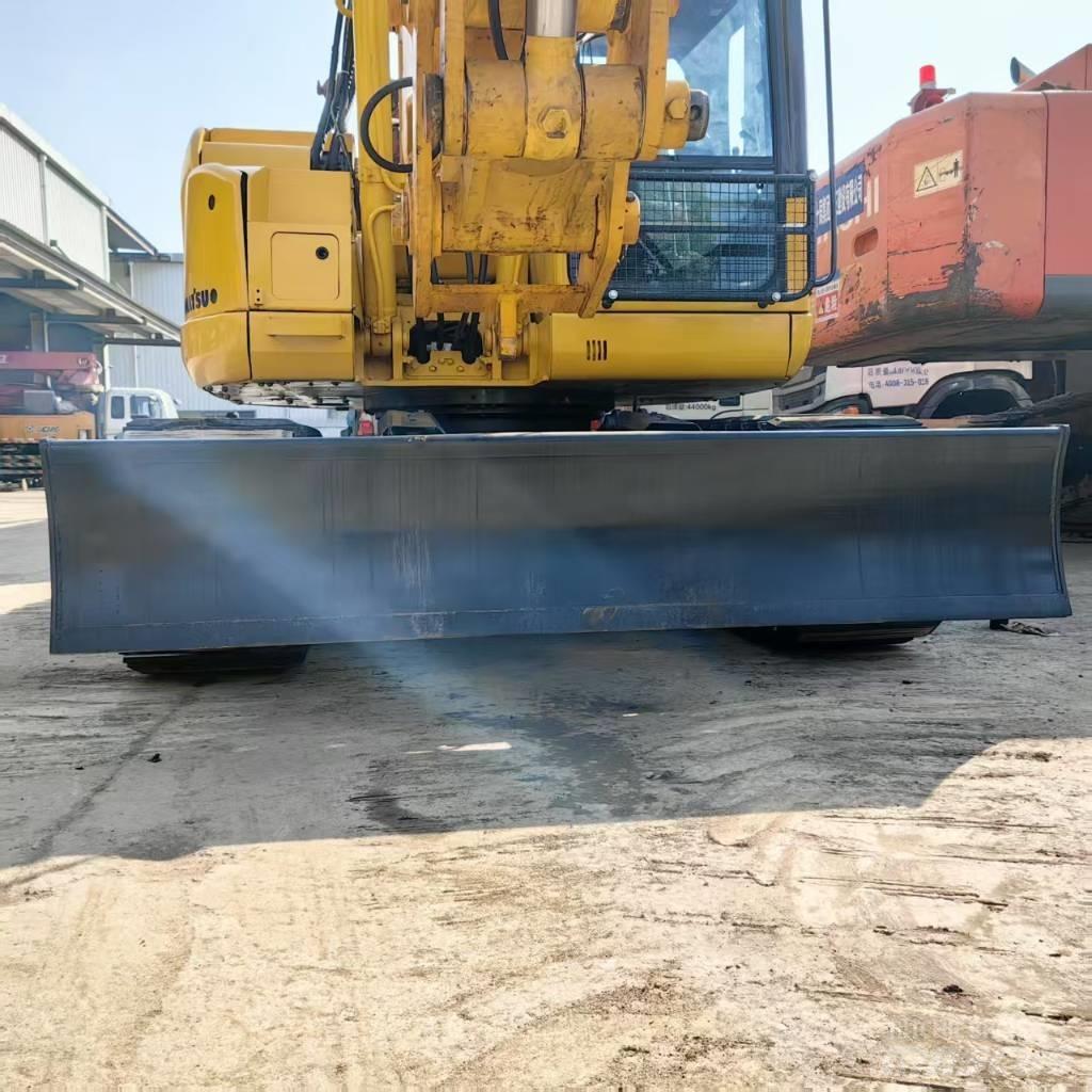 Komatsu PC 128 US Midi bagri 7t – 12t