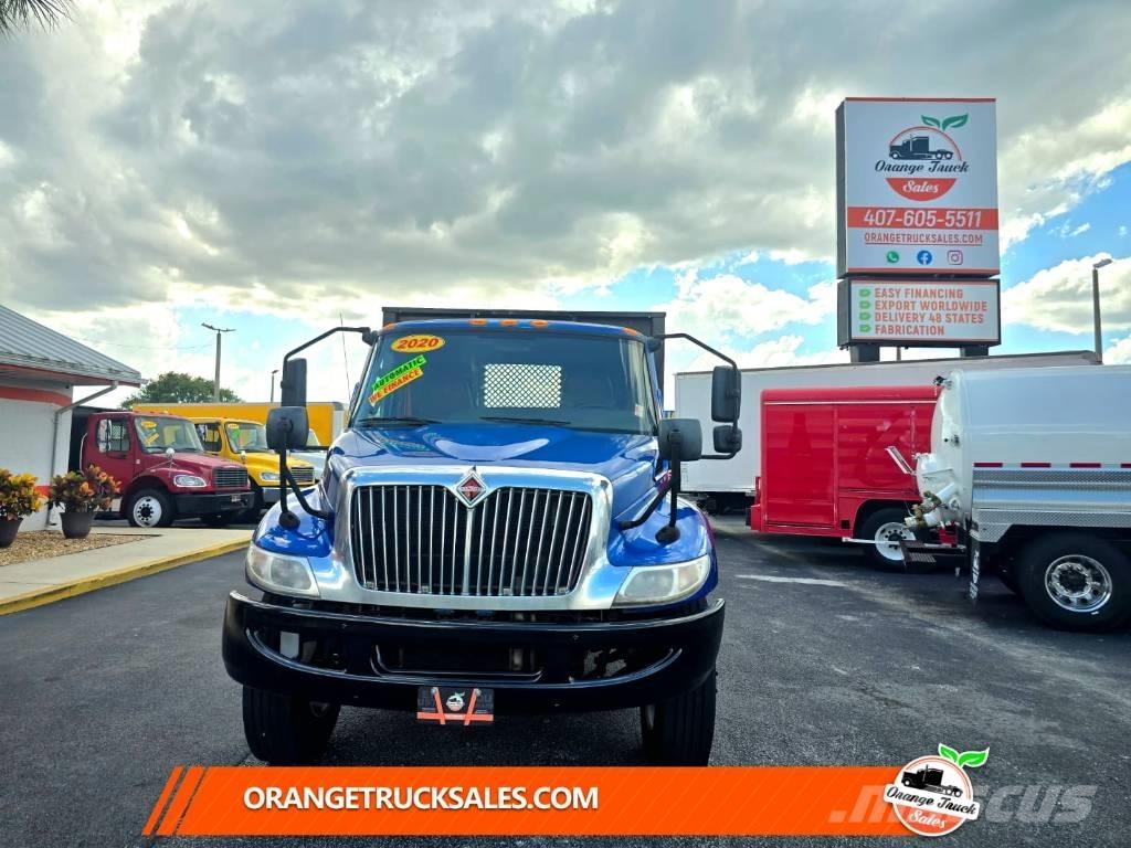 International MV607 Tovornjaki s kesonom/platojem