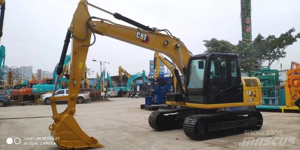 CAT 2021 CAT 313D2GC Bagri na kolesih