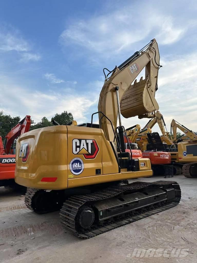 CAT 323 Bagri goseničarji