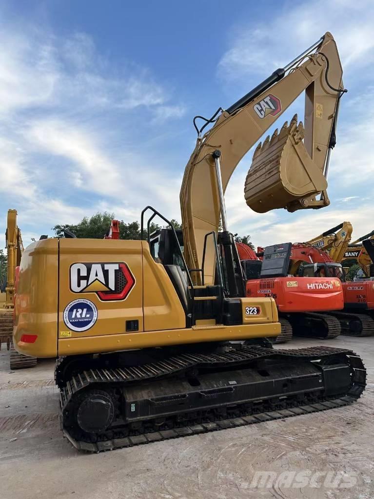 CAT 323 Bagri goseničarji