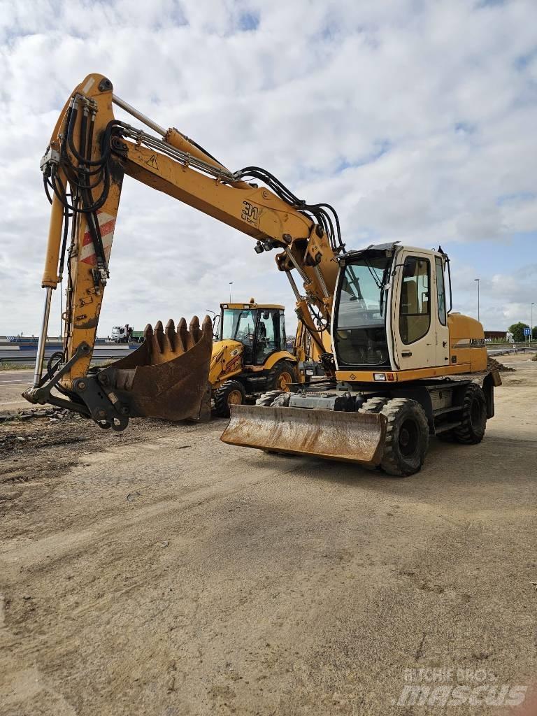 Liebherr 314 Bagri na kolesih