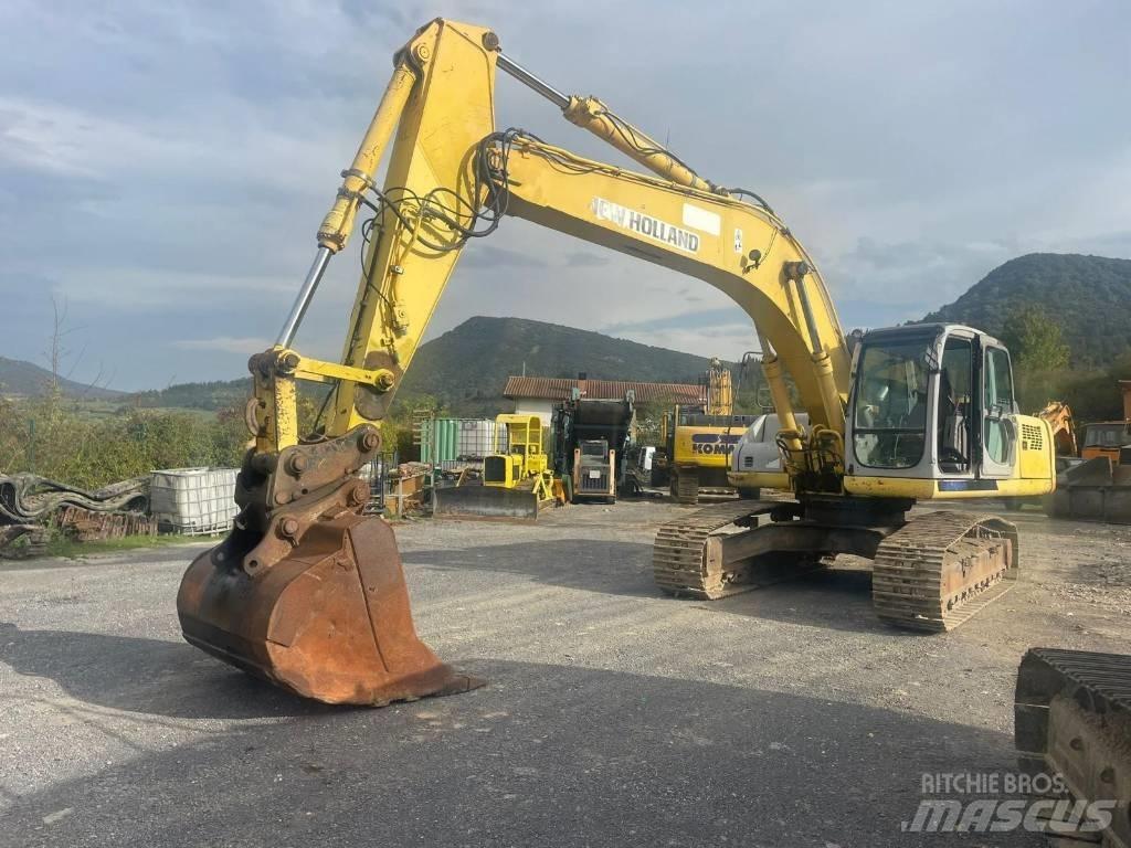 New Holland E 305 Bagri goseničarji