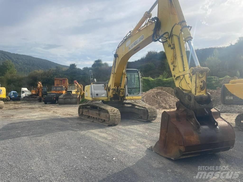New Holland E 305 Bagri goseničarji