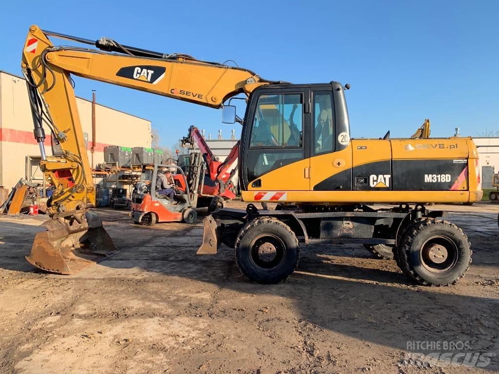 CAT M 318 D Bagri na kolesih