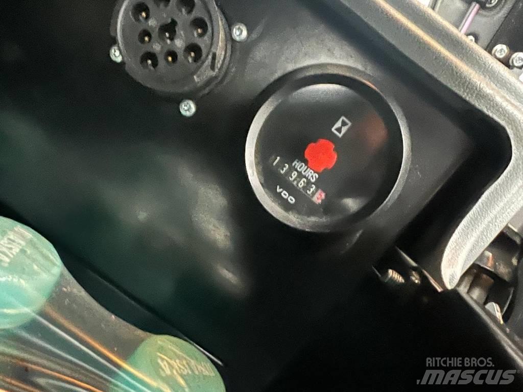 John Deere 1010 E Forwarderji