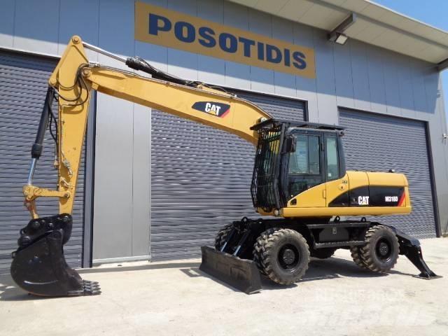CAT M 318 D Bagri na kolesih