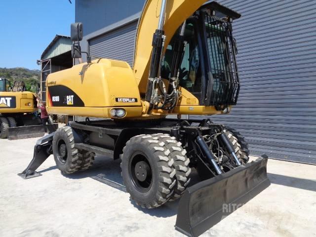 CAT M 318 D Bagri na kolesih