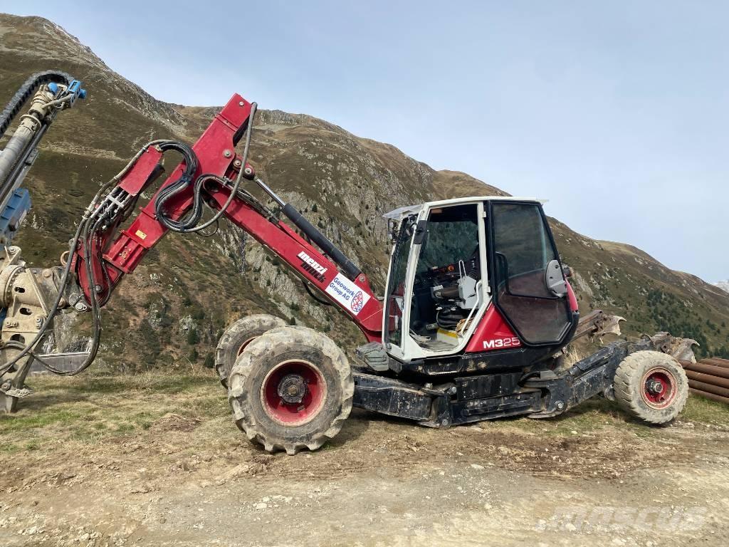 Menzi Muck 325 Bagri na kolesih