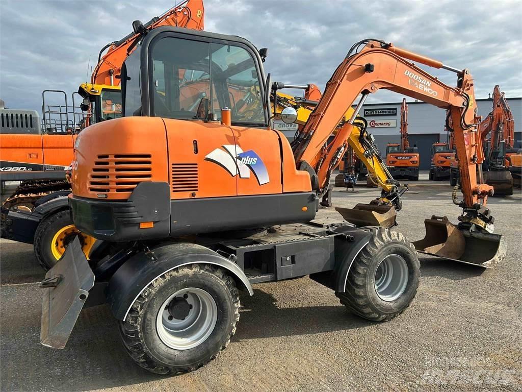 Doosan 55w Bagri na kolesih