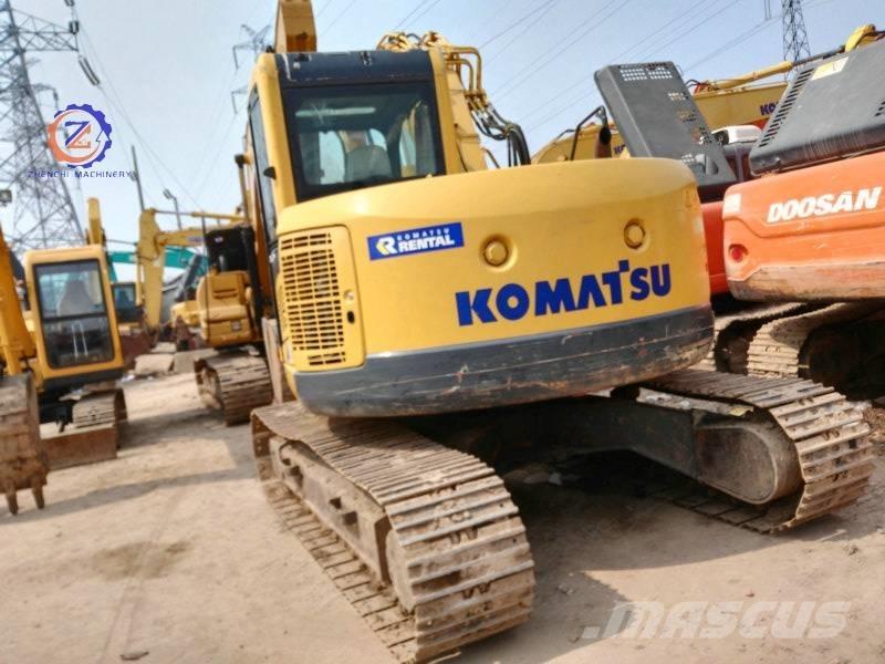 Komatsu PC 128 US Midi bagri 7t – 12t