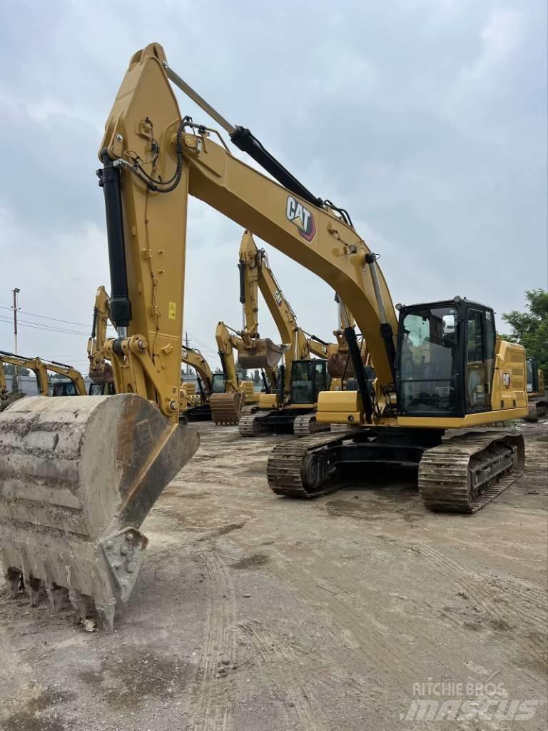 CAT 323 GC Bagri goseničarji