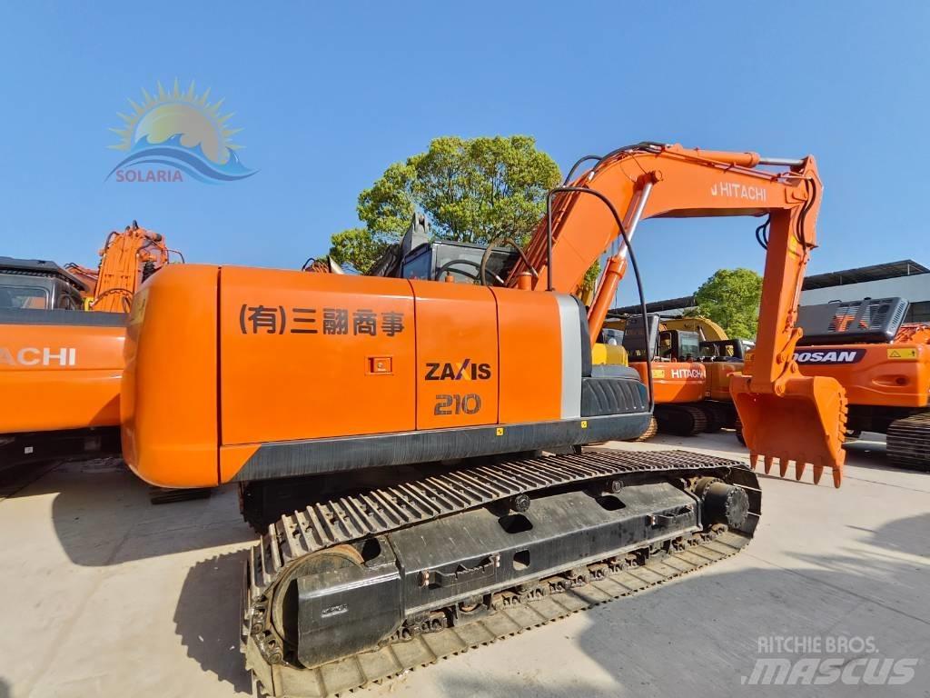 Hitachi ZX 210 Bagri goseničarji
