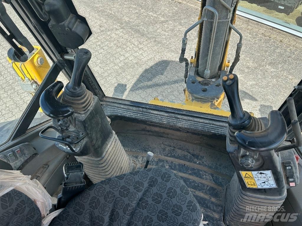 New Holland B 100 C Rovokopači
