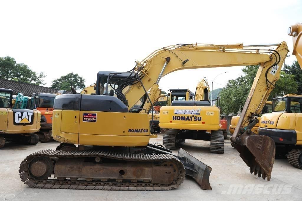 Komatsu PC 128 US Midi bagri 7t – 12t