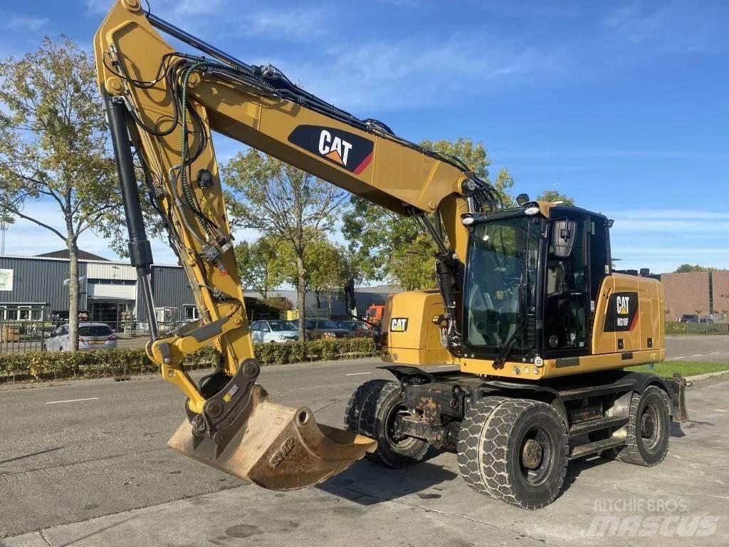 CAT M318F Bagri na kolesih